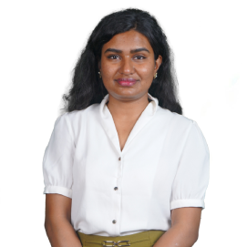 Professional head-and-shoulders portrait of a smiling woman with dark hair, wearing a white blouse against a white background.